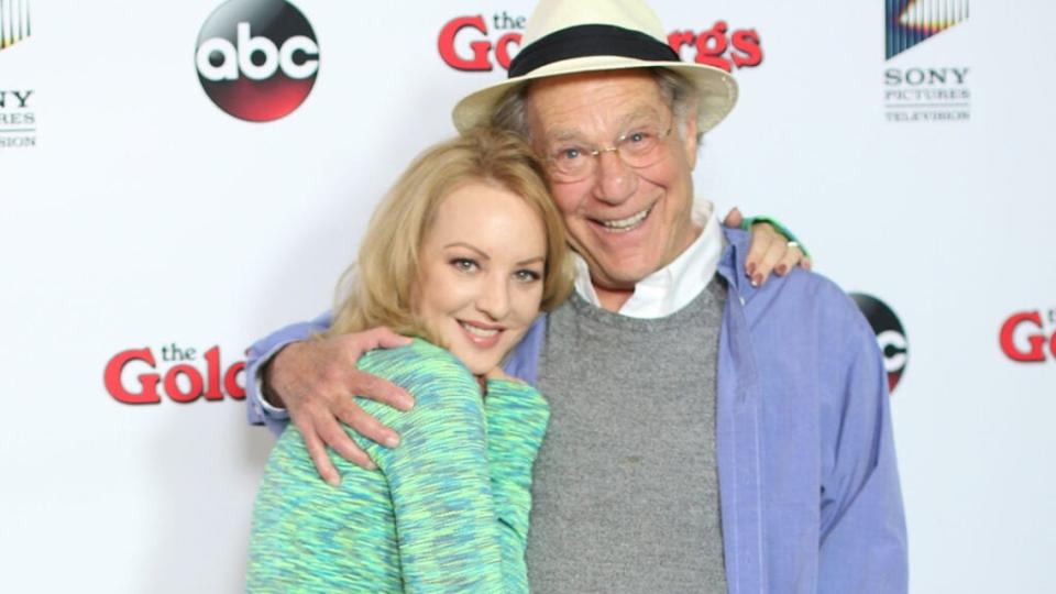Wendi McLendon-Covey (L) and George Segal attend ‘The Goldbergs’ press event held at the Moonlight Rollerway in September 2014