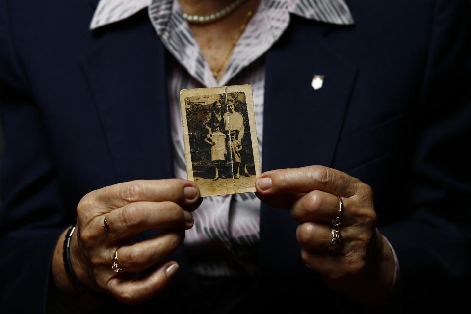 Auschwitz death camp survivor Maria Stroinska poses for a portrait in Warsaw