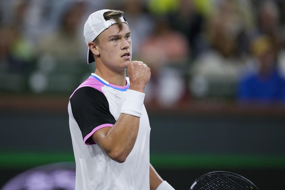 Holger Rune, of Denmark, reacts to winning a point against Taylor Fritz, of the United States, at the BNP Paribas Open tennis tournament, Wednesday, March 13, 2024, in Indian Wells, Calif. (AP Photo/Mark J. Terrill)