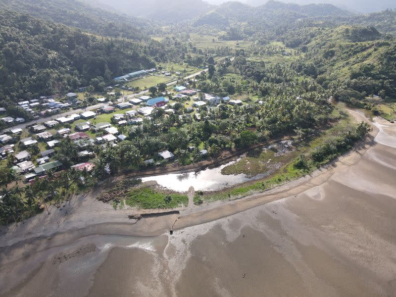 Fijian villagers choose to stay and fight to save their homes from rising sea levels