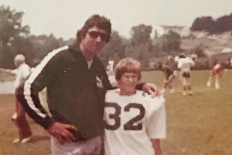 Joe Namath and Philip Lyle Smith at one of Namath’s football camps. (Lewis Baach Kaufmann Middlemiss PLLC)