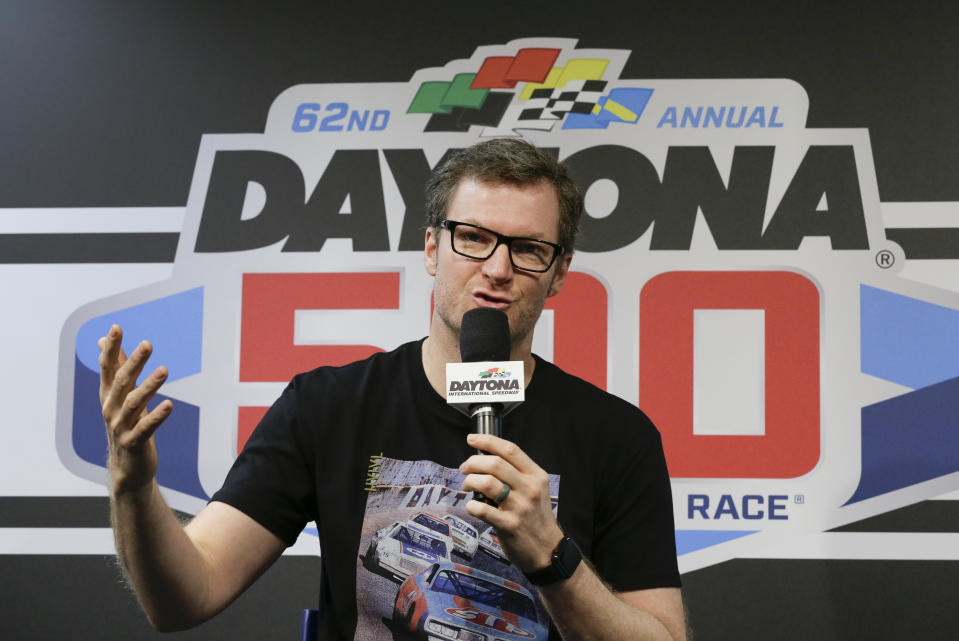 FILE - Dale Earnhardt Jr., team owner and TV analyst, answers questions during a news conference before the NASCAR Daytona 500 auto race at Daytona International Speedway in Daytona Beach, Fla., in this Sunday, Feb. 16, 2020, file photo. There’s a pointed episode in Dale Earnhardt Jr.’s television show that encapsulates Earnhardt's remarkable transformation from a bashful third-generation racer into a multimedia personality. (AP Photo/Terry Renna, File)