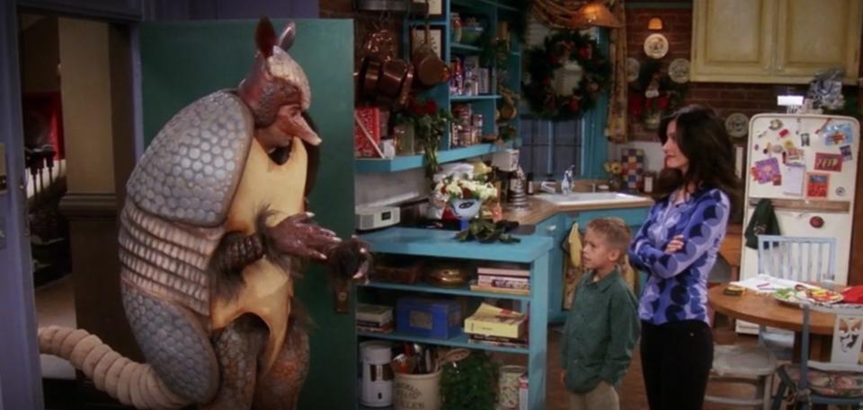 Actors David Schwimmer, Cole Sprouse and Courteney Cox in "The One with the Holiday Armadillo"