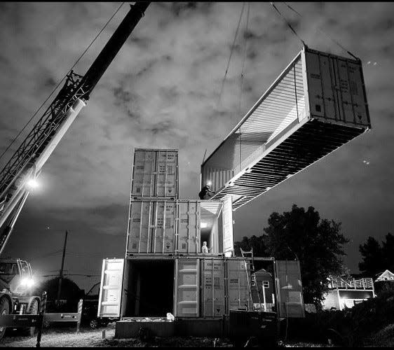 Building a shipping container home and business out of tragedy