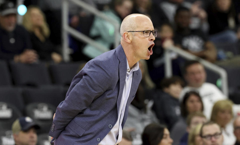 UConn head coach Dan Hurley yells calls during the second half of an NCAA college basketball game against Providence, Saturday, March 9, 2024, in Providence, R.I. (AP Photo/Mark Stockwell)