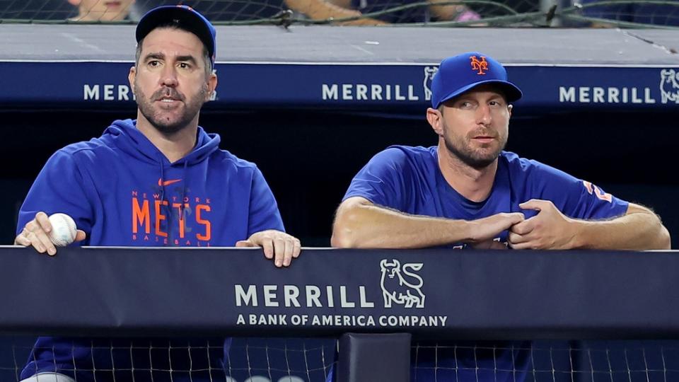 Jul 26, 2023; Bronx, New York, USA; New York Mets starting pitchers Justin Verlander (35) and Max Scherzer (21) watch from the dugout during the sixth inning against the New York Yankees at Yankee Stadium. Mandatory Credit: Brad Penner-USA TODAY Sports