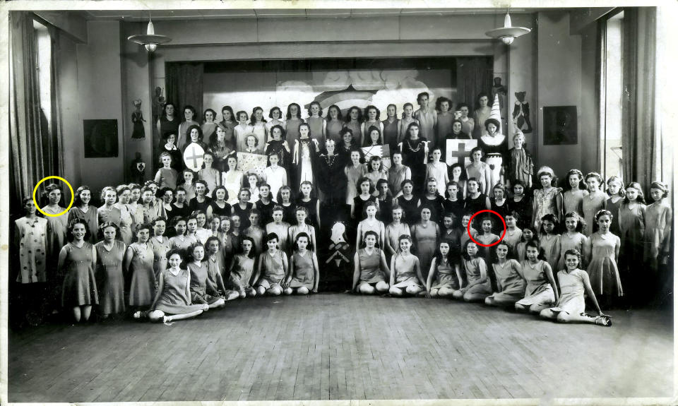 Margaret Moore (RED) & Audrey Sishton (YELLOW) pictured at school in 1949. See SWNS story SWMDreunited; Two schoolfriends who last saw each other in 1951 have been reunited at a residential care home after more than 70 years apart. Audrey Sishton and Margaret Moore, both 86, were friends at the Belt Road School for Girls in Cannock, Staffs., during the late 1940s and early 1950s. After they had finished school, the pair went in their separate directions to marry and raise their families. Despite both still continuing to live in the Cannock area, the pair last saw each other in 1951 when they both were 15-years-old. Now, the friends have been reunited at the Littleton Lodge care home in Hednesford, Staffs., after Audrey temporarily moved whilst her house was undergoing repair work. Margaret, who has four children and seven grandchildren, had been living at the luxury care home on Bishop Street since June 2021.  Audrey immediately clocked eyes on fellow Belt Road School for Girls pupil Margaret, who had been in her class, and the pair quickly rekindled their friendship. 