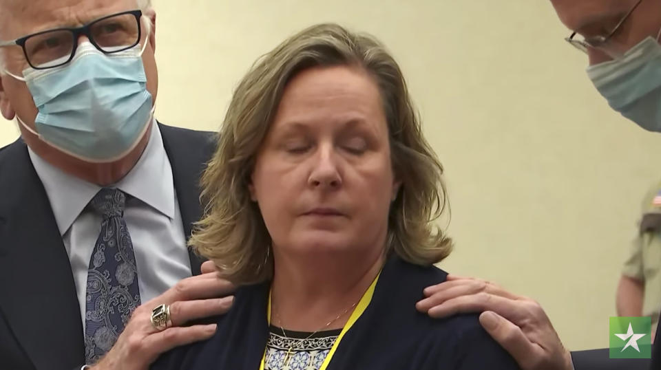 In this image taken from video, former Brooklyn Center Police Officer Kim Potter stands with defense attorneys Earl Gray, left, and Paul Engh, as the verdict is read in her trial, Thursday, Dec.,23, 2021 at the Hennepin County Courthouse in Minneapolis, Minn. Jurors on Thursday convicted Potter of two manslaughter charges in the killing of Daunte Wright, a Black motorist she shot during a traffic stop after she said she confused her gun for her Taser.(Court TV via AP, Pool)