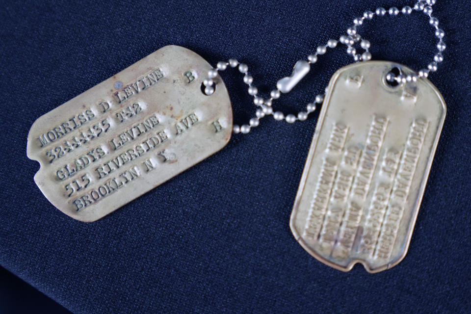 Dog tags worn by Alan Alda as he portrayed the wisecracking surgeon Hawkeye on the beloved television series "M-A-S-H" are displayed at Heritage Auctions in Irving, Texas, Wednesday, July 5, 2023. The items are up auction on July 28. (AP Photo/LM Otero)