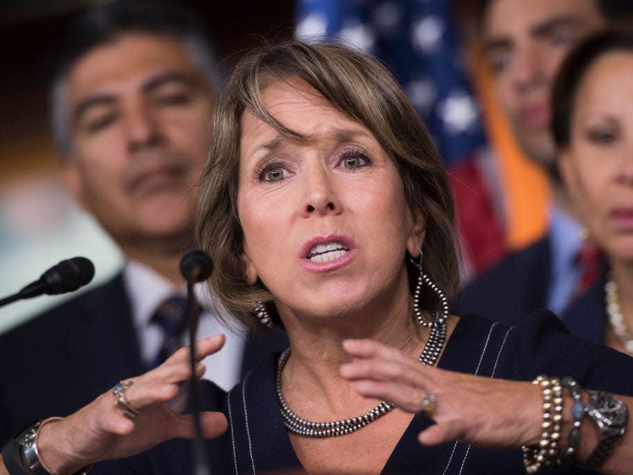 Michelle Lujan Grisham speaks at a news conference