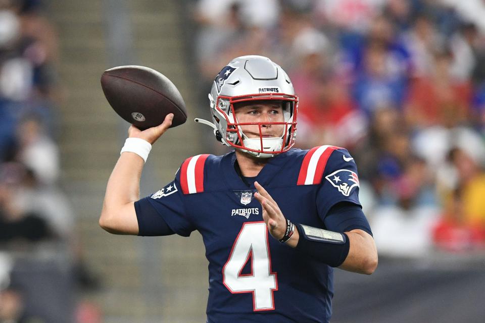 Aug 11, 2022; Foxborough, Massachusetts, USA; New England Patriots quarterback Bailey Zappe (4) looks to throw the ball against the New York Giants during the first half at Gillette Stadium. Mandatory Credit: Brian Fluharty-USA TODAY Sports