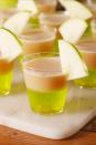 <p>If you have a sweet tooth but also love sour candy, this is the Thanksgiving shot recipe for you. It calls for Jolly Rancher-infused vodka and caramel. </p><p>Get the recipe from <a href="https://www.delish.com/cooking/recipe-ideas/a23121656/caramel-apple-jell-o-shots-recipe/" rel="nofollow noopener" target="_blank" data-ylk="slk:Delish;elm:context_link;itc:0;sec:content-canvas" class="link ">Delish</a>.</p>
