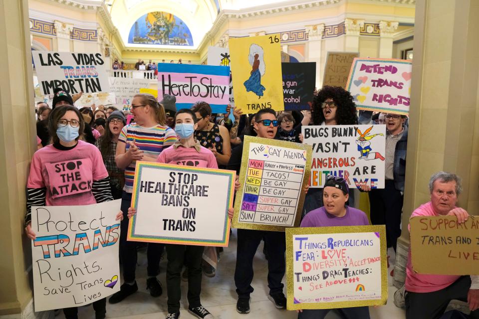 Trans supporters rally on Monday outside of the state Capitol before the start of the Legislature and Gov. Kevin Stitt's State of the State speech to the joint session.