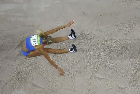 2016 Rio Olympics - Athletics - Preliminary - Women's Long Jump Qualifying Round - Groups - Olympic Stadium - Rio de Janeiro, Brazil - 16/08/2016. Darya Klishina (RUS) of Russia competes. REUTERS/Pawel Kopczynski