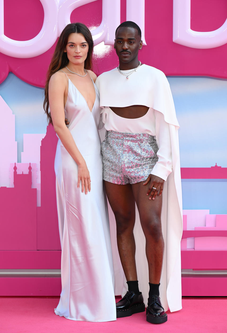 Emma Mackey, Ncuti Gatwa pose together for a photo on the pink carpet