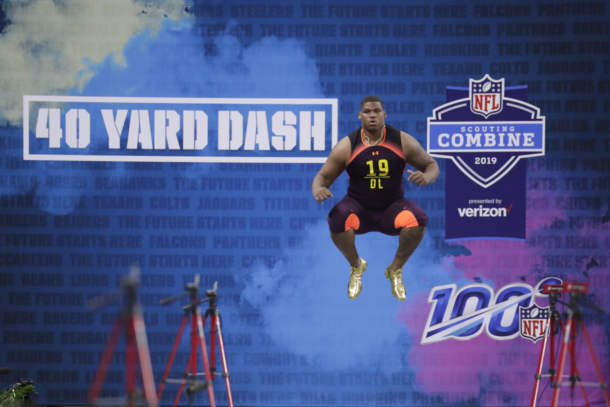 Alabama defensive lineman Quinnen Williams prepares to run the 40-yard dash at the NFL football scouting combine in Indianapolis, Sunday, March 3, 2019. (AP Photo/Michael Conroy)