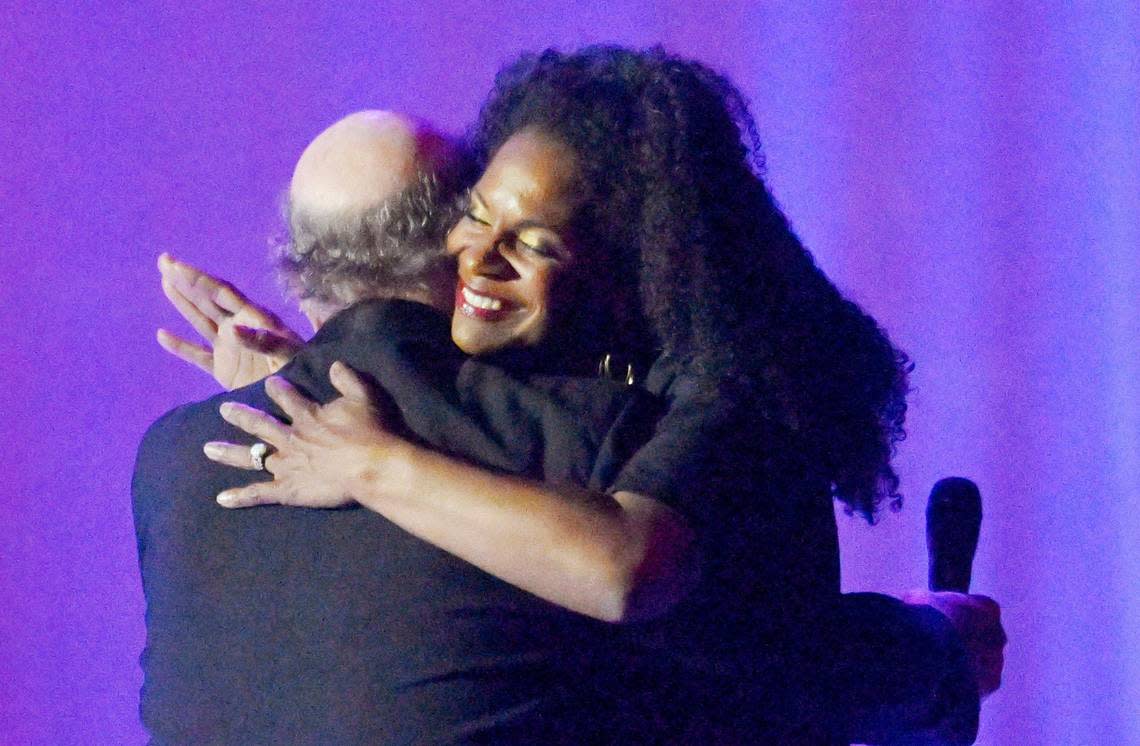 Good Company Players’ founder Dan Pessano, left, greets Audra McDonald as she takes the stage for her performance celebrating Good Company Players’ 50th anniversary, held at the Warnors Center for the Performing Arts Sunday, June 25, 2023 in downtown Fresno.