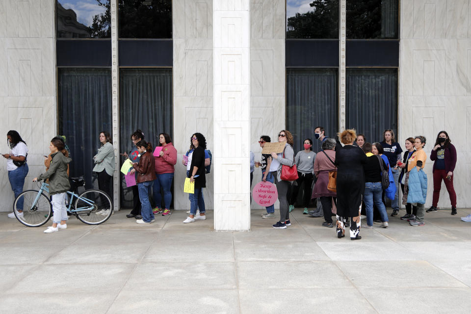 Abortion rights supporters wait to enter the general assembly following a rally at Bicentennial Plaza put on by Planned Parenthood South Atlantic in response to a bill before the North Carolina Legislature, Wednesday, May 3, 2023, in Raleigh, N.C. (AP Photo/Karl B DeBlaker)