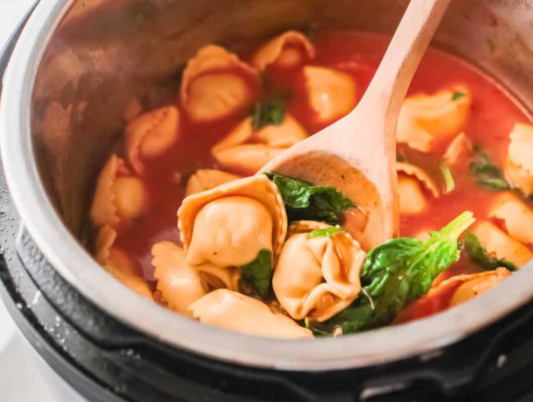 <p>Budget Delicious</p><p>Packed with chicken and veggies, this tortellini soup checks all the boxes for a easy and tasty meal.</p><p><strong>Get the recipe: <a href="https://budgetdelicious.com/instant-pot-tortellini-soup" rel="nofollow noopener" target="_blank" data-ylk="slk:Instant Pot Chicken Tortellini Soup;elm:context_link;itc:0;sec:content-canvas" class="link rapid-noclick-resp">Instant Pot Chicken Tortellini Soup</a></strong></p>
