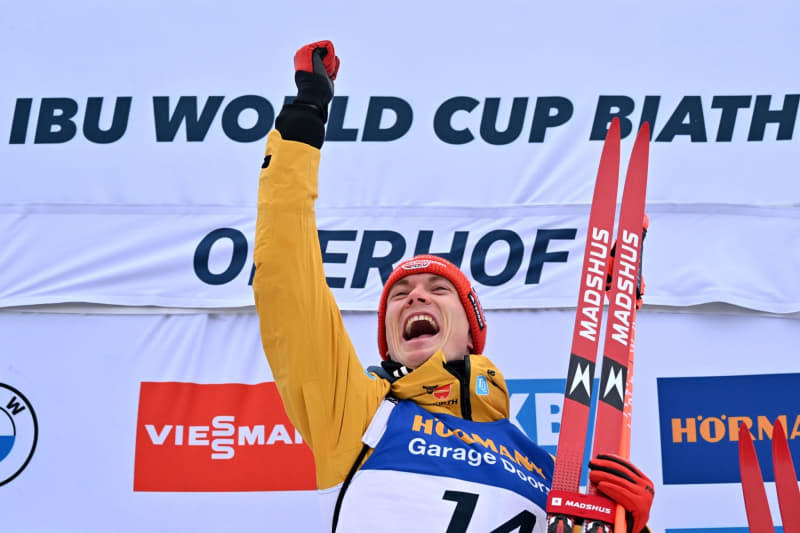 Germany's Benedikt Doll and celebrates after the men's 10 km sprint event of the IBU Biathlon World Cup in Oberhof. Martin Schutt/dpa