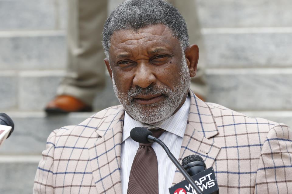 Rep. Oscar Denton, D-Vicksburg, a member of the Mississippi Legislative Black Caucus, expresses his approval of the passage by the Legislature of legislation to take down and replace the current state flag which contains the Confederate battle emblem, during a news conference at the Capitol in Jackson, Miss., Monday, June 29, 2020, (AP Photo/Rogelio V. Solis)