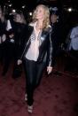 <p>Delicate straps that criss-crossed over your toes were everywhere in 2001, and Julia Roberts took the hint, wearing these black heels to the <em>Ocean's Eleven</em> premiere in Westwood, California. </p>