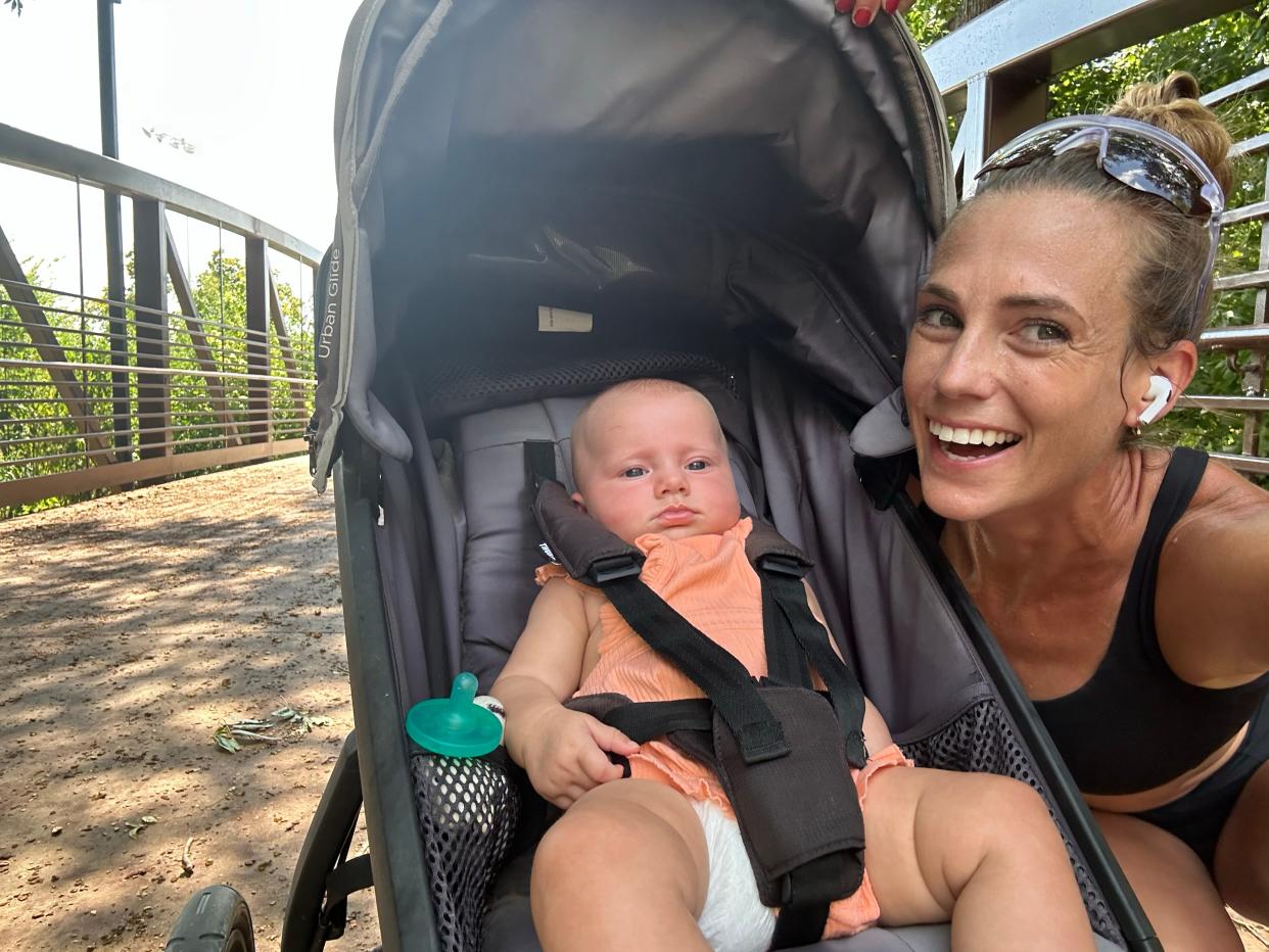 Detroit Free Press Marathon Elite Division entrant Hope Hill, 32, of Austin, Texas, squeezes in training runs with daughter Margot, almost 1, in a jogging stroller.