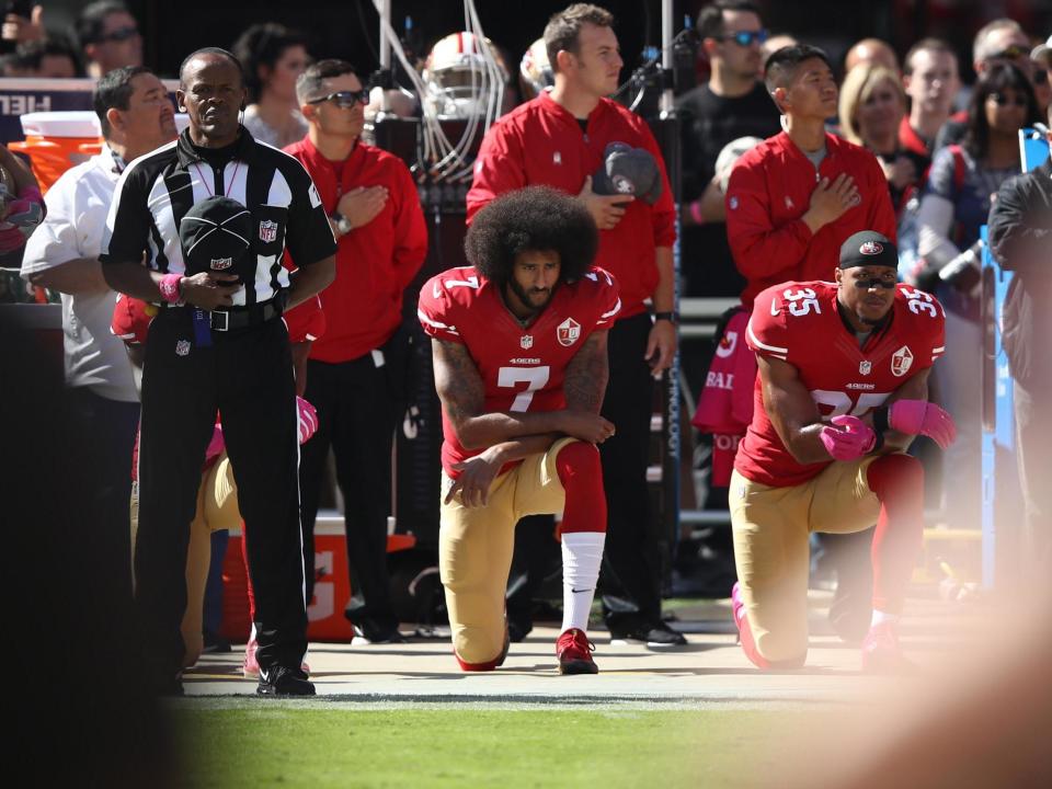 Colin Kaepernick protesting before a game in 2016: (Getty Images)