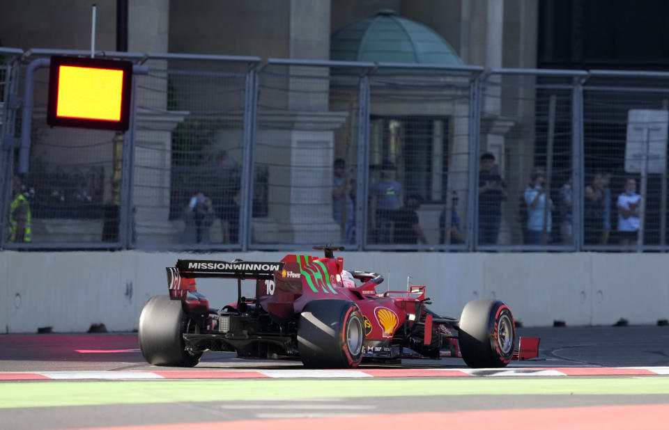 Ferrari driver Charles Leclerc of Monaco steers his car during the qualifying session at the Baku Formula One city circuit in Baku, Azerbaijan, Saturday, June 5, 2021. The Azerbaijan Formula One Grand Prix will take place on Sunday. (AP Photo/Darko Vojinovic)