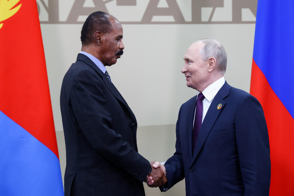 Russian President Vladimir Putin, right, and President of the State of Eritrea Isaias Afwerki shake hands during their meeting on the sideline on the sideline of the Russia Africa Summit in St. Petersburg, Russia, Friday, July 28, 2023. (Artyom Geodakyan/TASS Host Photo Agency Pool Photo via AP)