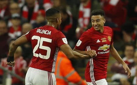 Britain Soccer Football - Southampton v Manchester United - EFL Cup Final - Wembley Stadium - 26/2/17 Manchester United's Jesse Lingard celebrates scoring their second goal with Antonio Valencia Reuters / Darren Staples