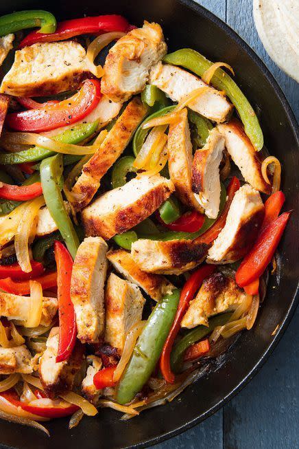 <p>Fajitas are the perfect weeknight dinner. Minimal prep and minimal cook time means these can be on your table FAST. </p><p>Get the <a href="https://www.delish.com/uk/cooking/recipes/a30146397/easy-chicken-fajitas-recipe/" rel="nofollow noopener" target="_blank" data-ylk="slk:Chicken Fajitas;elm:context_link;itc:0;sec:content-canvas" class="link ">Chicken Fajitas</a> recipe.</p>