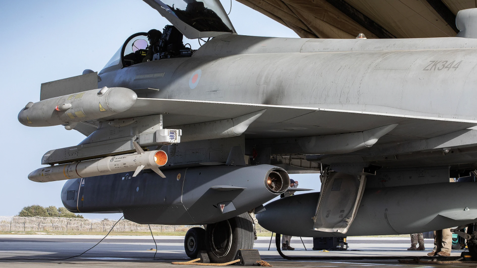 A Storm Shadow under the wing of a U.K. Royal Air Force Typhoon FGR4 fighter jet, which has used the cruise missile to attack ISIS targets during the air campaign in Iraq and Syria. <em>Crown Copyright</em><br>