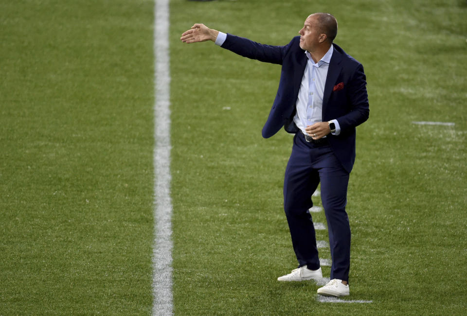 Portland Timbers head coach Giovanni Savarese yells out to his team during the first half of an MLS soccer match against the Vancouver Whitecaps in Portland, Ore., Sunday, Sept. 27, 2020. (AP Photo/Steve Dykes)