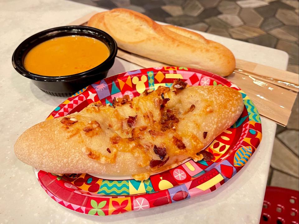 roule au fromage and lobster bisque on paper plates from france pavilion in epcot