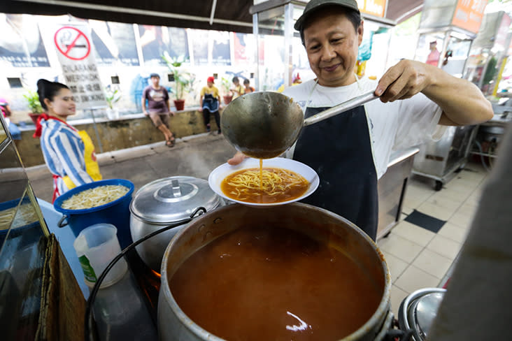 Paul New Poh Kim brews the thick broth using pumpkin, potatoes and his own-made chilli paste.