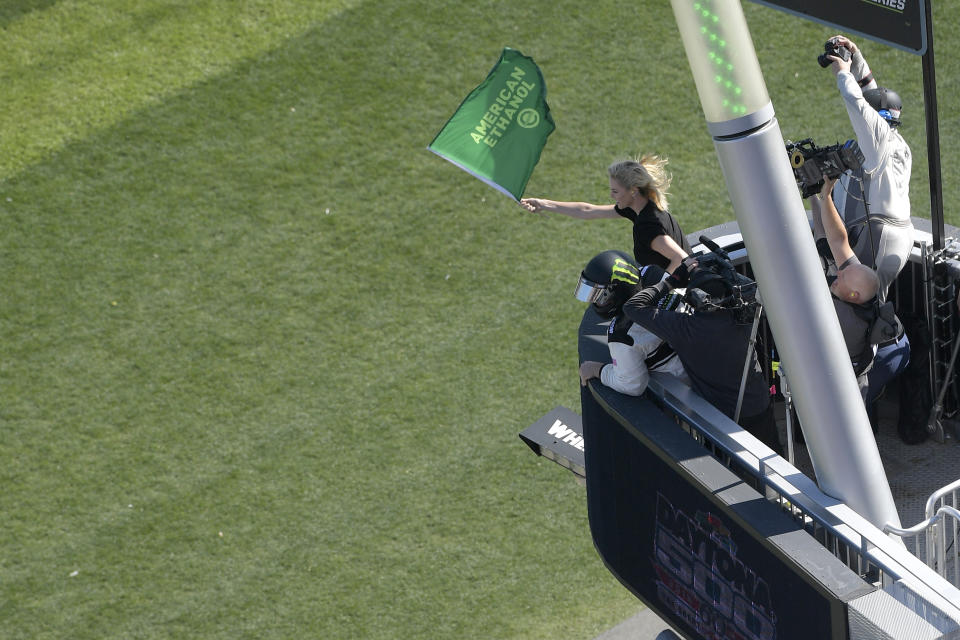 Charlize Theron waves Daytona 500 green flag as honorary starter