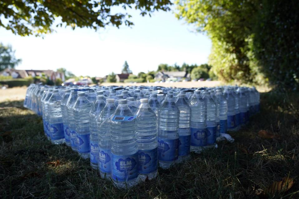 Bottles of water supplied by Thames Water for residents in the village of Northend in Oxfordshire (Andrew Matthews/PA) (PA Wire)