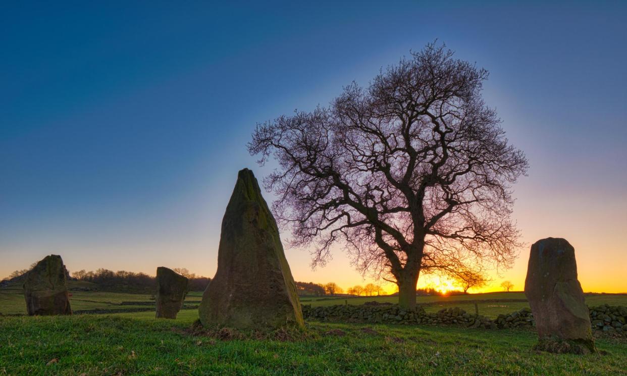 <span>Sunset at the Nine Stones Close stone circle in the Peak District.</span><span>Photograph: Doug Blane/Peak District Pictures/Alamy</span>