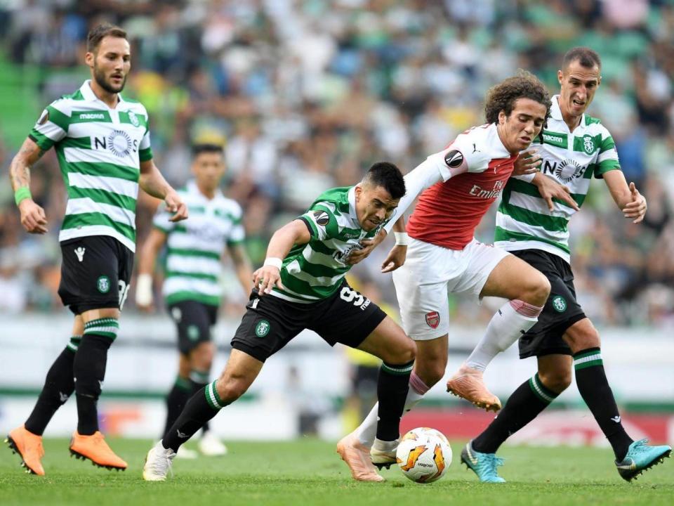 Matteo Guendouzi attempts to wrestle back possession (Getty)