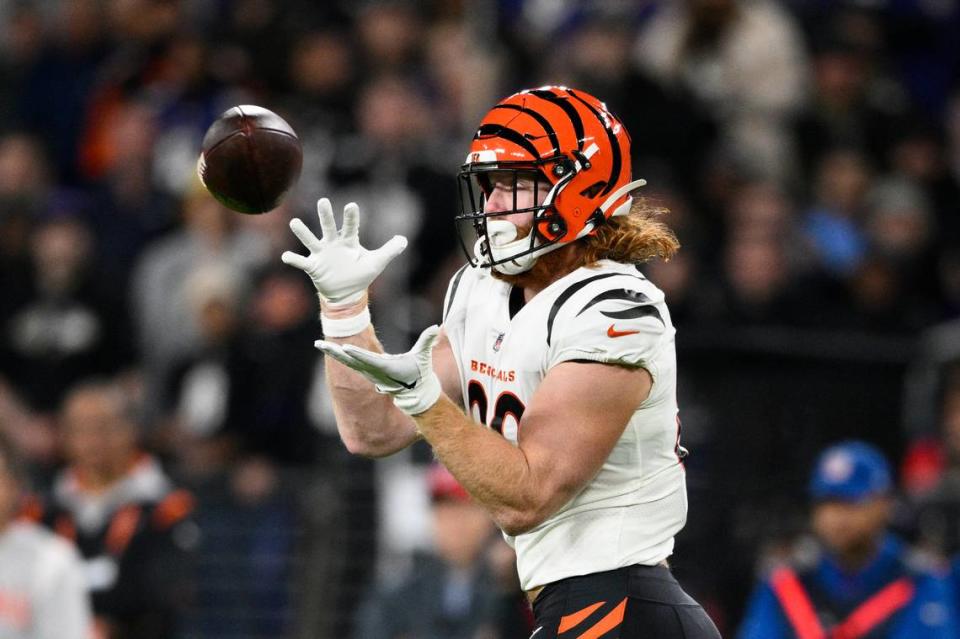 Cincinnati Bengals’ Hayden Hurst catches a pass during the first half of an NFL football game against the Baltimore Ravens, Sunday, Oct. 9, 2022, in Baltimore.