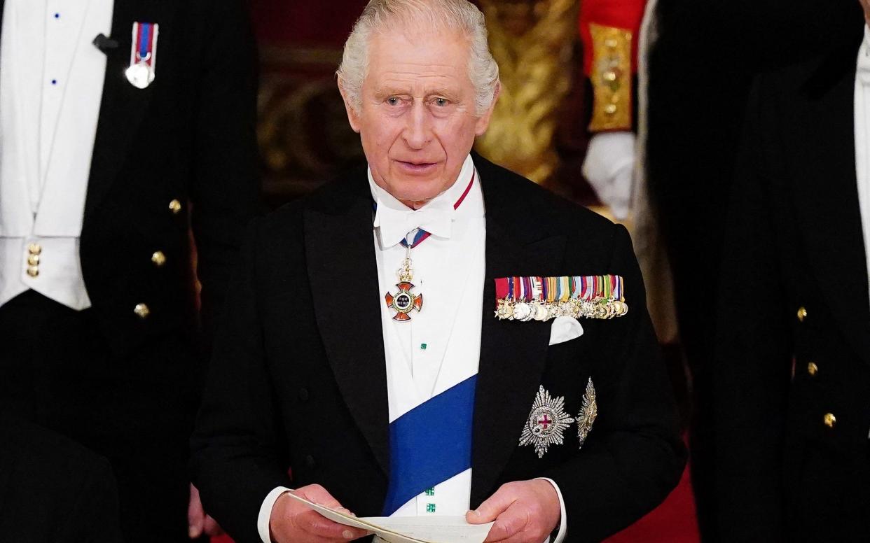 King Charles giving a speech during a State Banquet at Buckingham Palace last November - AFP