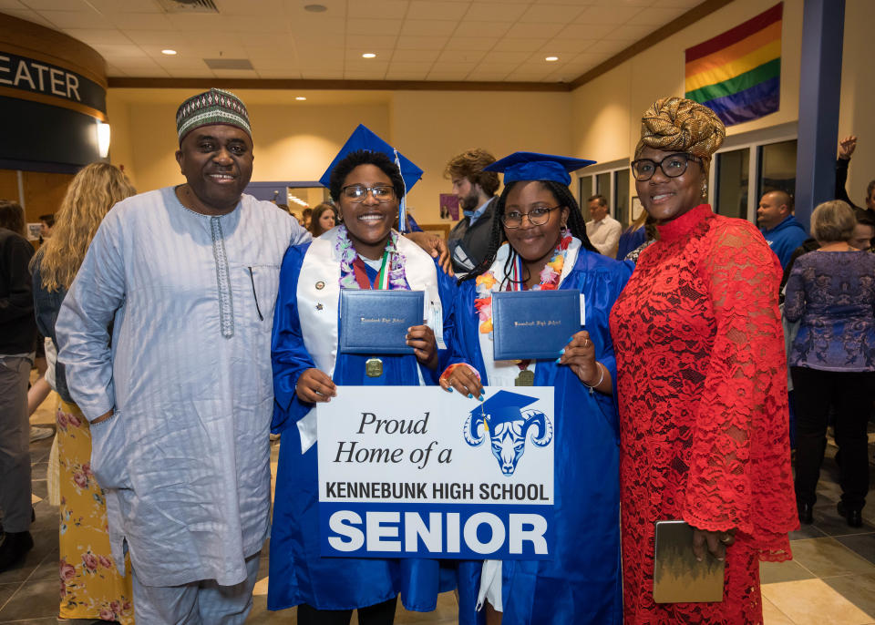 Graduate sisters and twins Adora and Amede Olise with their parents after graduating on Sunday.