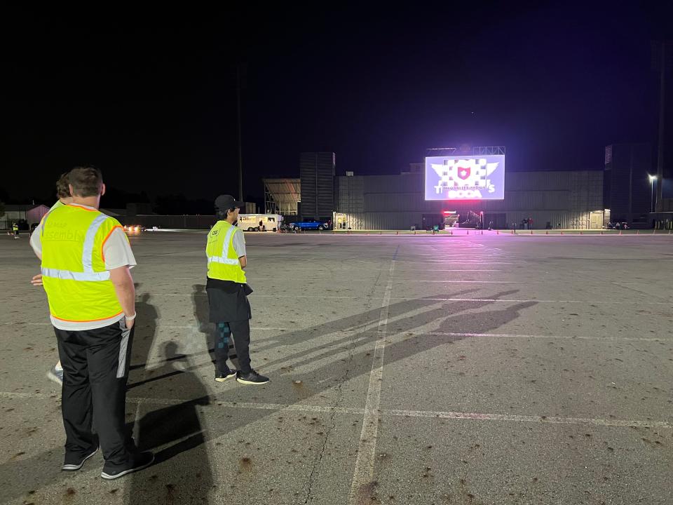 Three corner workers at an autocross event