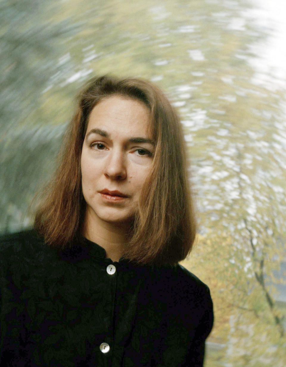 FILE -Author Lorrie Moore, poses for a portrait at her home in Madison, Wisc., Oct. 27, 1998. Moore, 41, is among those rare short story writers who make national best-seller lists. Lorrie Moore won the prize for fiction on Thursday, March 21, 2024, while Judy Blume and her longtime ally in the fight against book bans, the American Library Association were given honorary prizes by the National Book Critics Circle. (AP Photo/Andy Manis, File)
