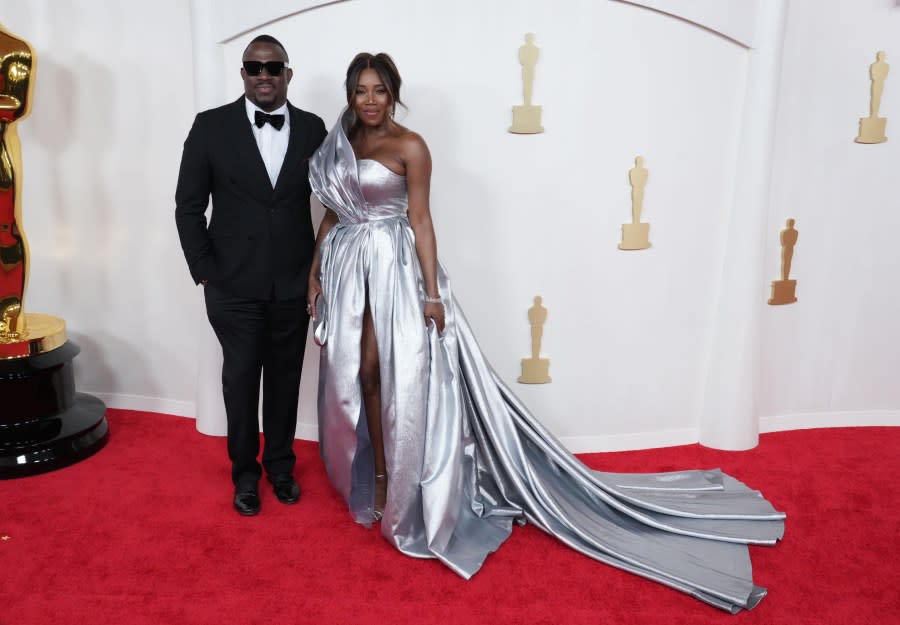 HOLLYWOOD, CALIFORNIA – MARCH 10: (L-R) DJ M.O.S and DJ Kiss attend the 96th Annual Academy Awards on March 10, 2024 in Hollywood, California. (Photo by Jeff Kravitz/FilmMagic)