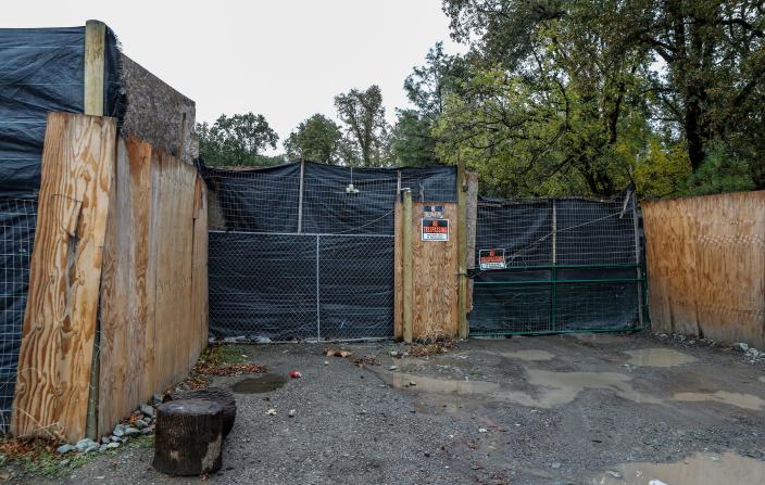 A common site around Covelo, California, are high-walled fences to keep people out.  
