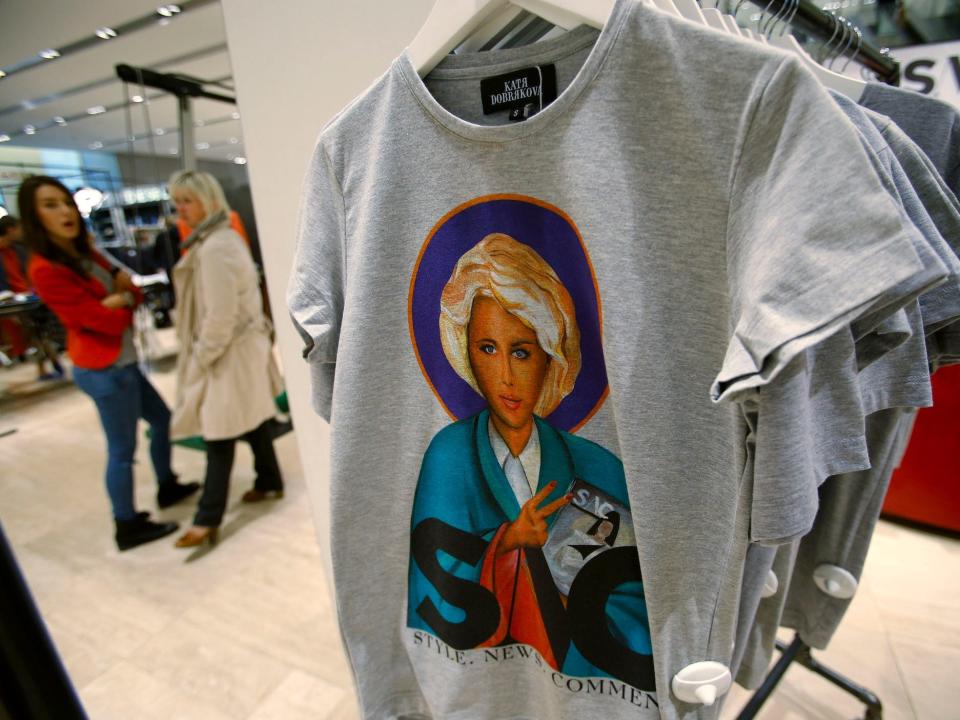 T-shirts with portraits of Ksenia Sobchak, a Russian socialite turned opposition activist, are on display in a shop in Moscow, Saturday, Sept. 15, 2012. Ksenia Sobchak has been converted into Moscow's 'Style Icon,' transformed into an icon of the Virgin Mary in a new promotional campaign.