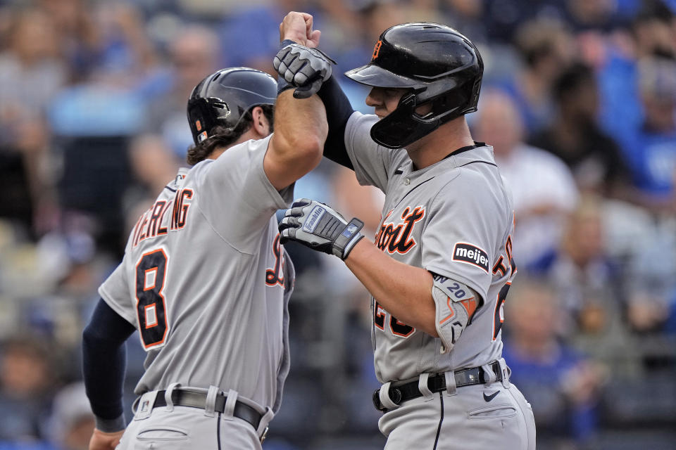 Detroit Tigers first baseman Spencer Torkelson, right, celebrates with Matt Vierling (8) after hitting a two-run home run during the first inning of a baseball game against the Kansas City Royals Tuesday, July 18, 2023, in Kansas City, Mo. (AP Photo/Charlie Riedel)