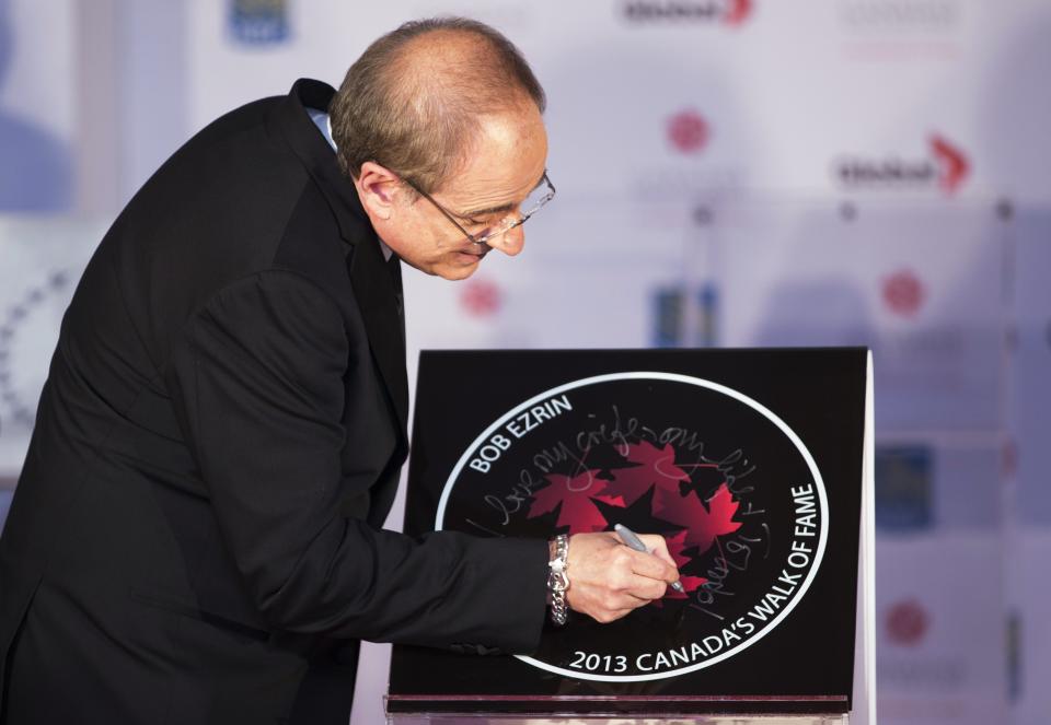 Music Producer Ezrin writes on his star during Canada's Walk of Fame induction ceremonies in Toronto